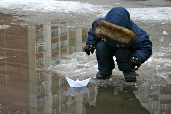 Get Started Worldbuilding CANVA boy with paper boat