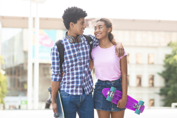 11-09-23 4 Tips for Writing Teen Romance CANVA Teen Couple skateboard