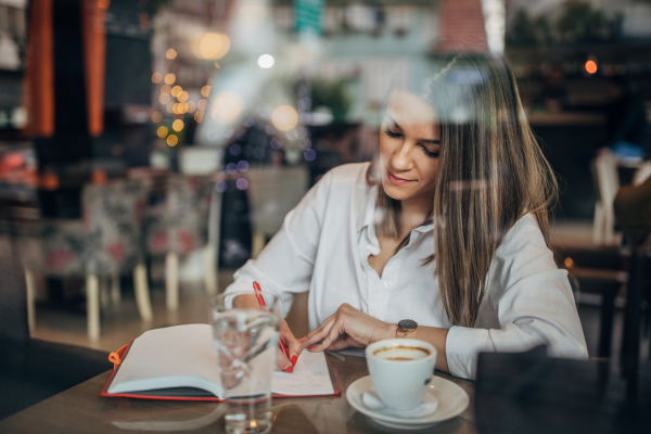 A Back-to-School State of Mind CANVA writing at coffee house